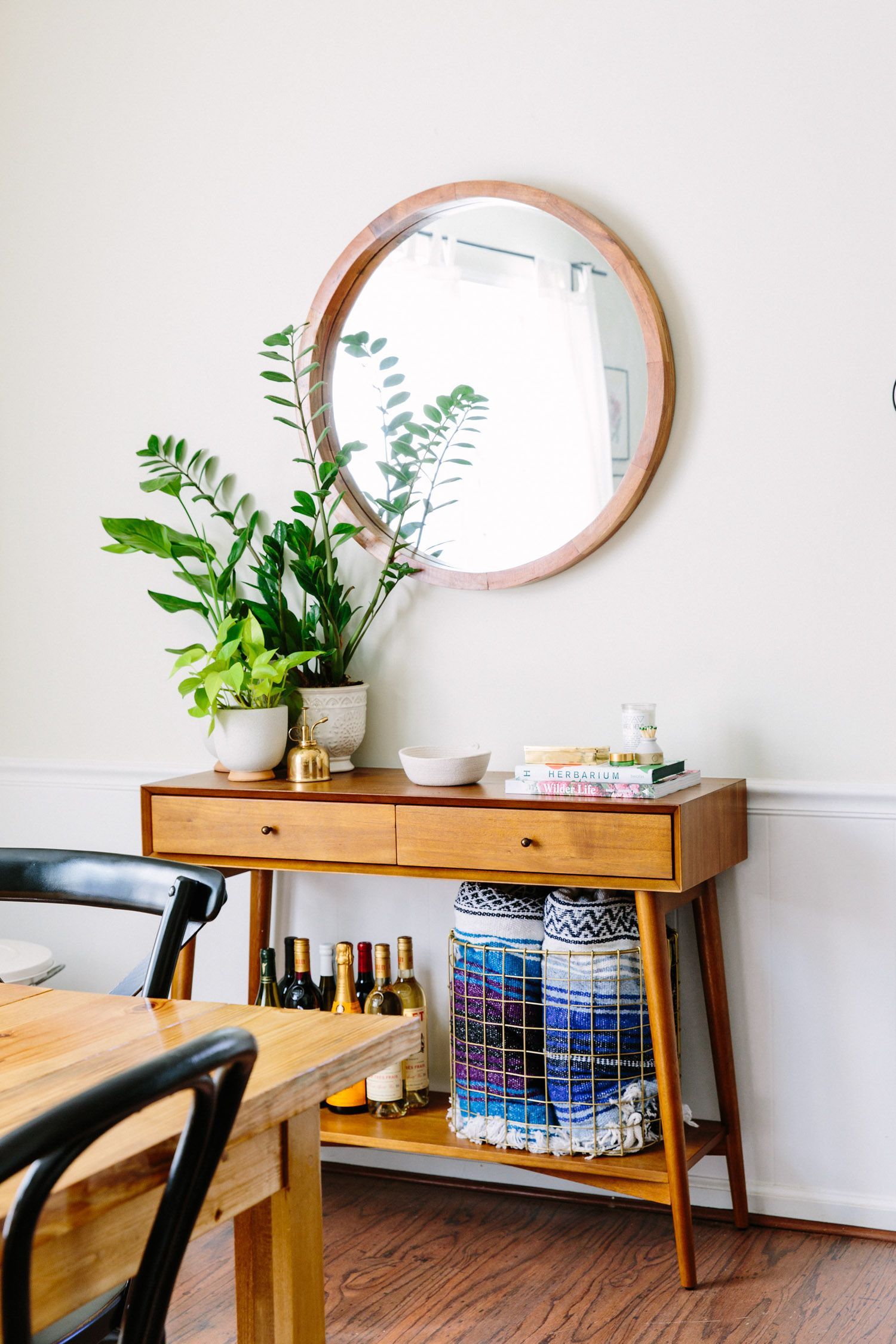 Cute credenza with storage to hold blankets and booze // bar cart stand in // open storage that looks good