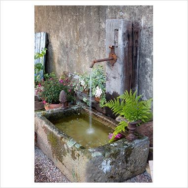 GAP Photos - Garden & Plant Picture Library - Rustic water feature - GAP Photos - Specialising in horticultural photography