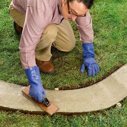 How to do poured concrete border. I kinda like this idea Tom. I could make desighns in it and you could mow over it too…..