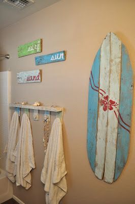 LOTS of totally cute beachy ideas here  http://seeshellspace.blogspot.com/2013/05/my-beachy-bathroom-makeover-for-under-30.html