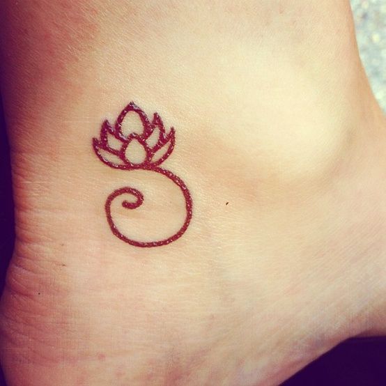 lotus tattoo on the foot; like a red tattoo