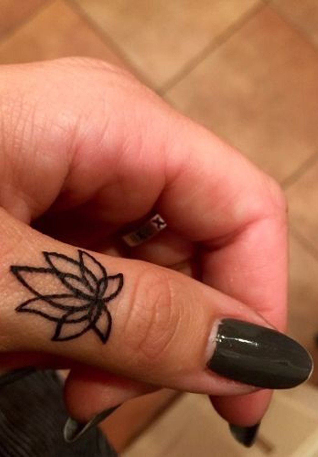 Simple Lotus Finger Tattoo Ideas at MyBodiArt.com – Mandala Flower Hand Tat Placement Thumb