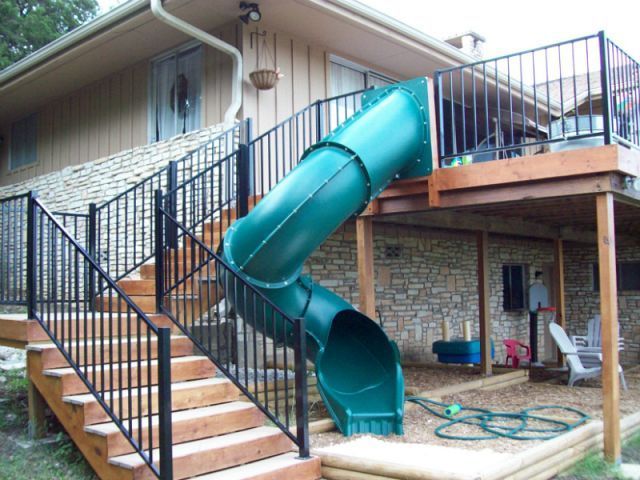 Slide from a raised or two level deck. Could be removed when the kids are older …or maybe not.