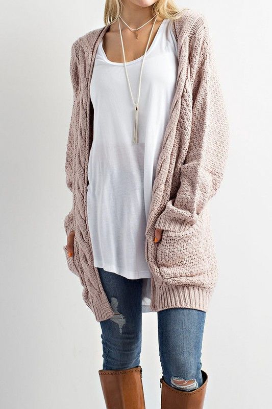 This Cable Knit Cardigan Sweater is so on trend this season! This cozy slightly oversized sweater is soft and features an open
