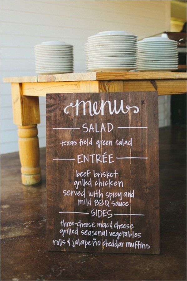 Throwing a backyard BBQ? This simple wooden menu is sure to please! @myweddingdotcom