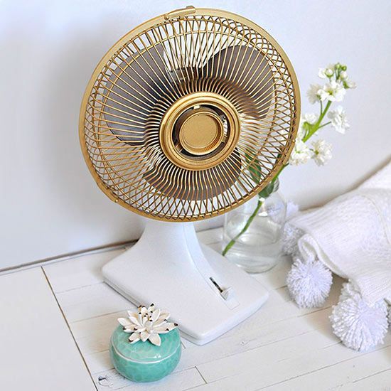 Turn a blah fan into eye-catching decor with gold paint.