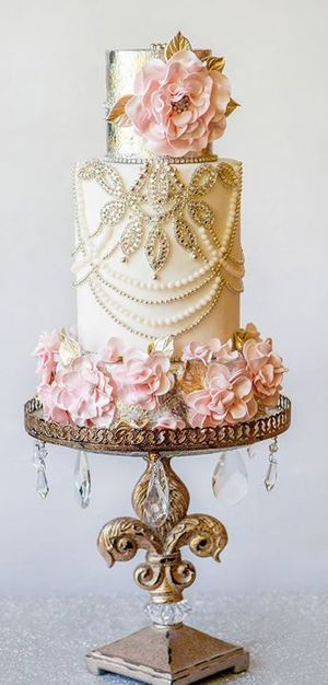 Vintage Glam Cake – love this. Could drape in faux pearls and use silk flowers that look like the ones on my dress.