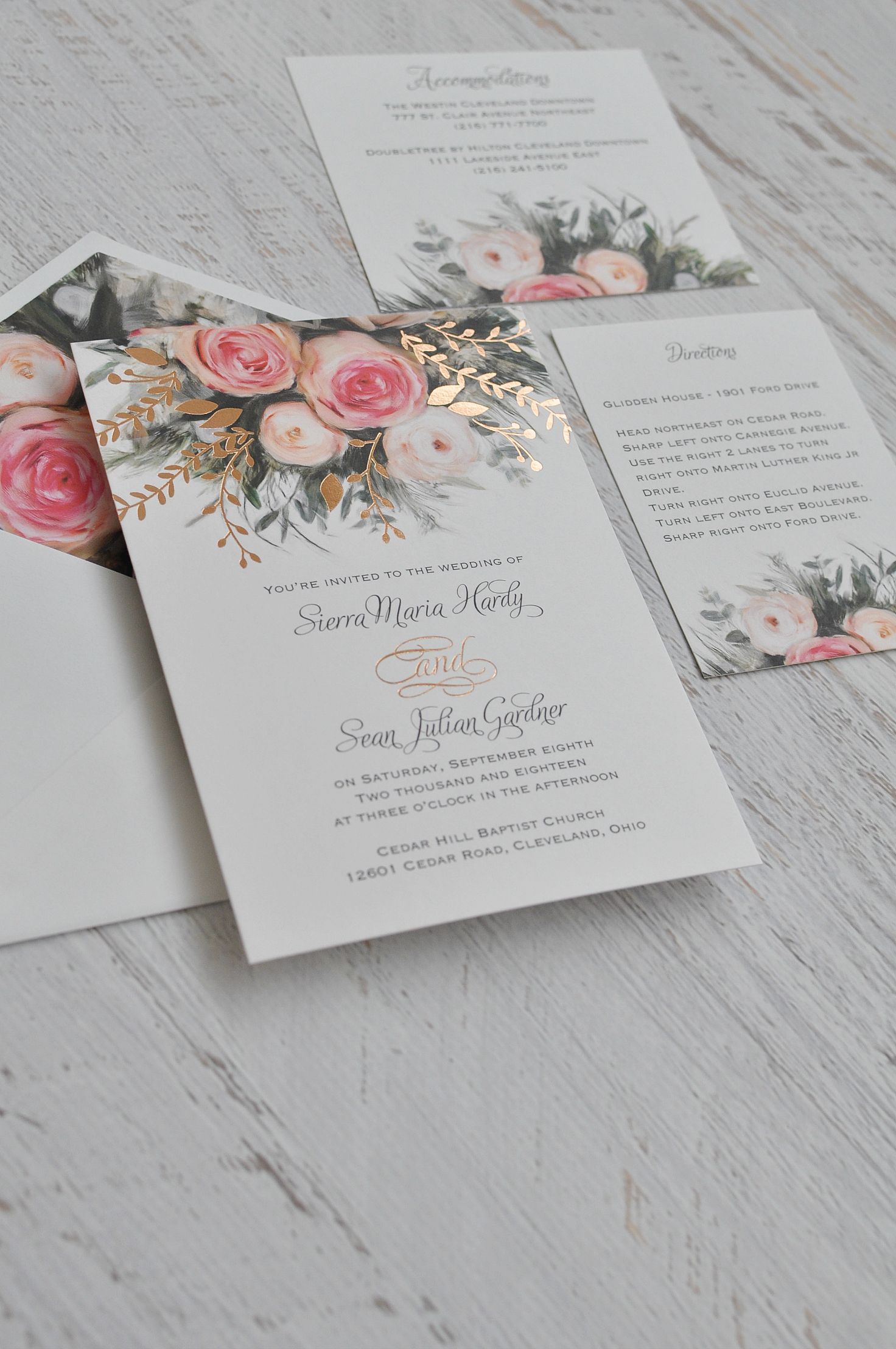 An ethereal illustration of watercolor roses in pink creates the peaceful nature of these beautiful garden wedding invitations.