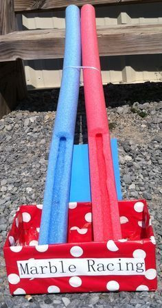 Carnival Party ~ Marble Race ~ made with cut pool noodles, box wrapped in wrapping paper, two marbles – Crafting By Holiday