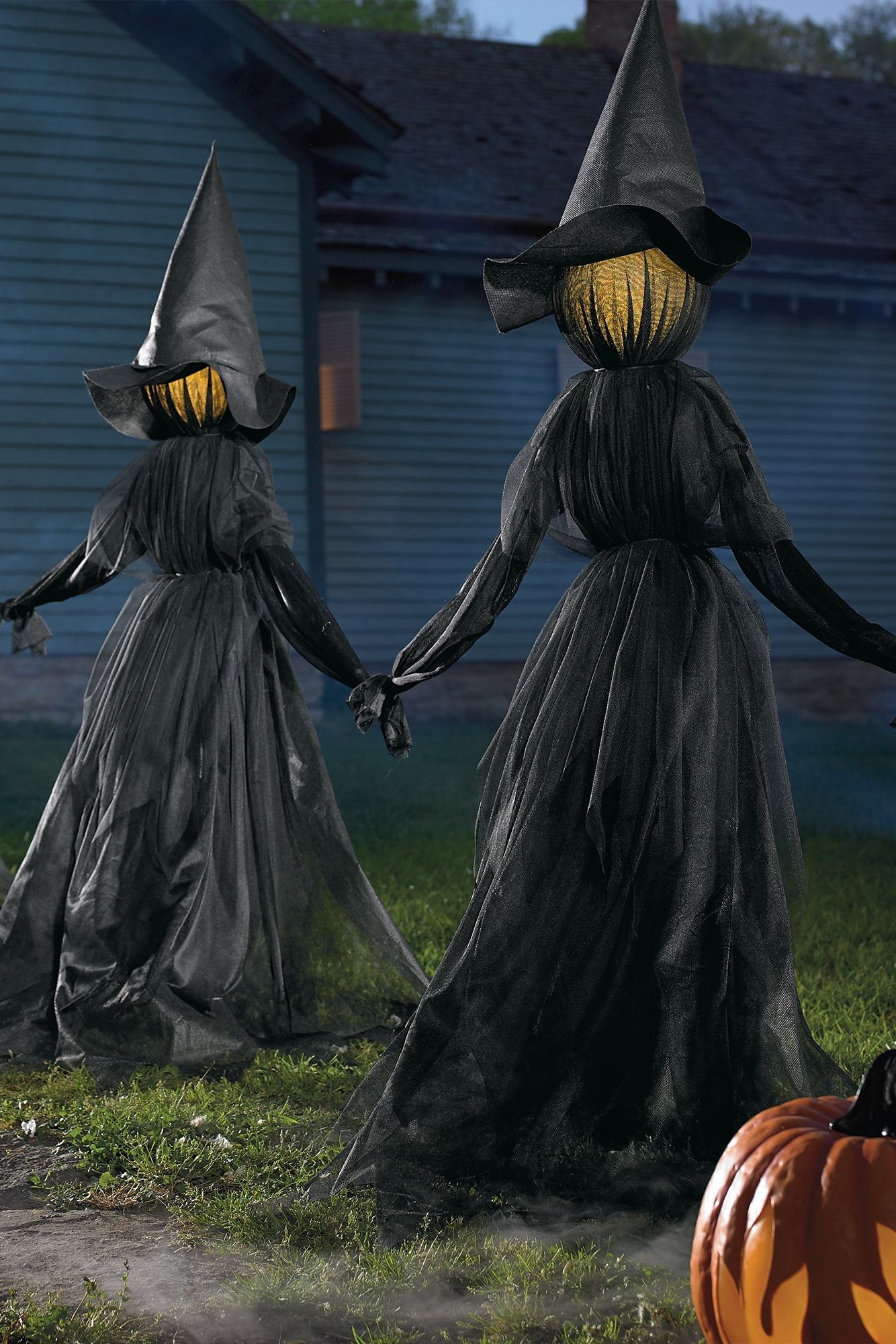 Easily craft the biggest spine-tingling spectacle on the block with a gloomy gathering of our lighted Holding Hands Witches on