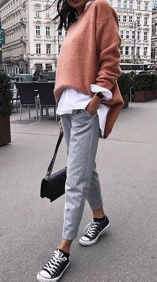 fall street style. tailored trousers. white shirt. knit jumper. sneakers.