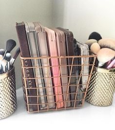 Keep all your makeup palettes on display and within reach by storing them in cool copper wire baskets on your vanity.