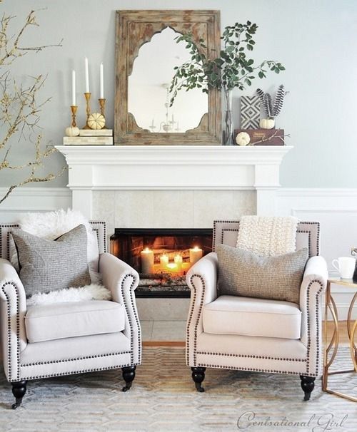 Love these chairs in  front of the fireplace.