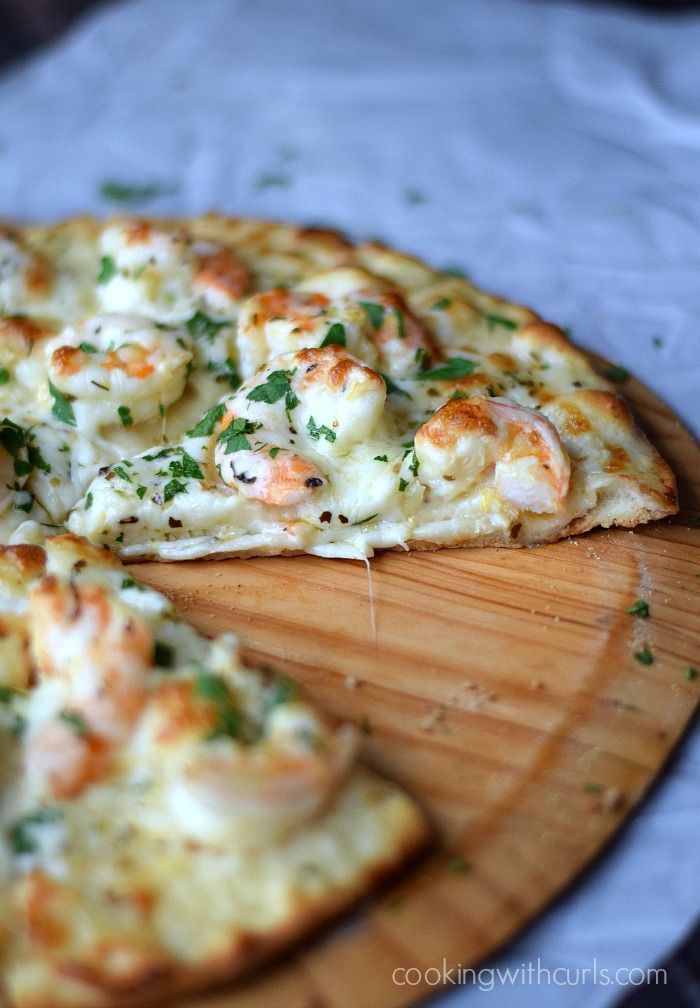 Shrimp Scampi Pizza with a thin, crispy crust, garlic-lemon sauce, and cheeses | http://cookingwithcurls.com