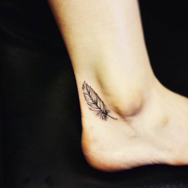 Small feather tattoo