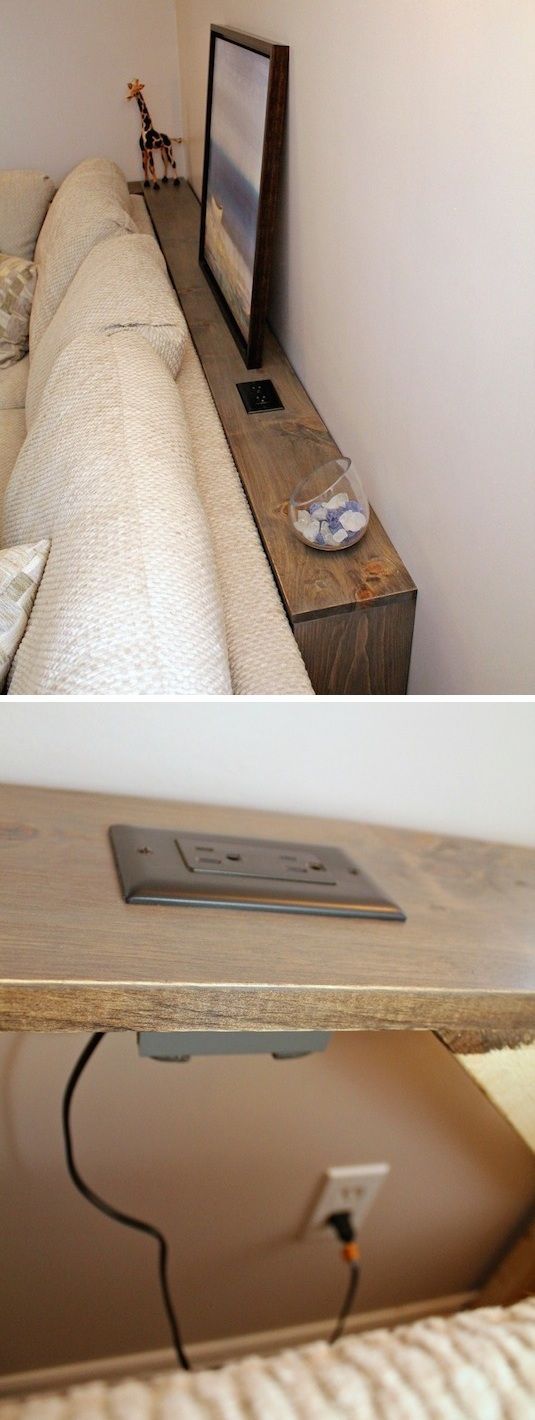 Small space idea for the living room! A skinny table with a built-in outlet for behind the couch.