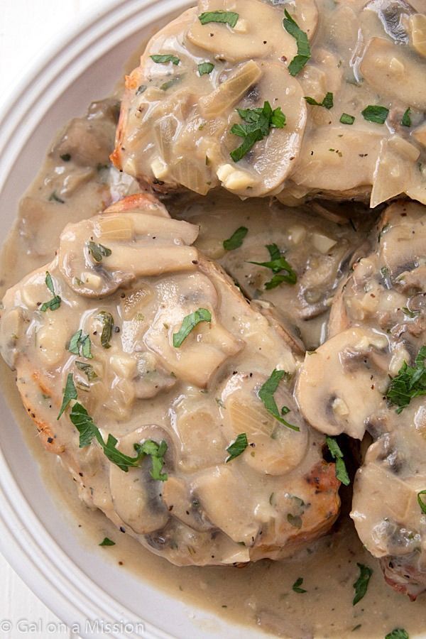 Pork Chops with Creamy Mushroom Sauce: So moist and baked to perfection with an out-of-this-world creamy sauce!