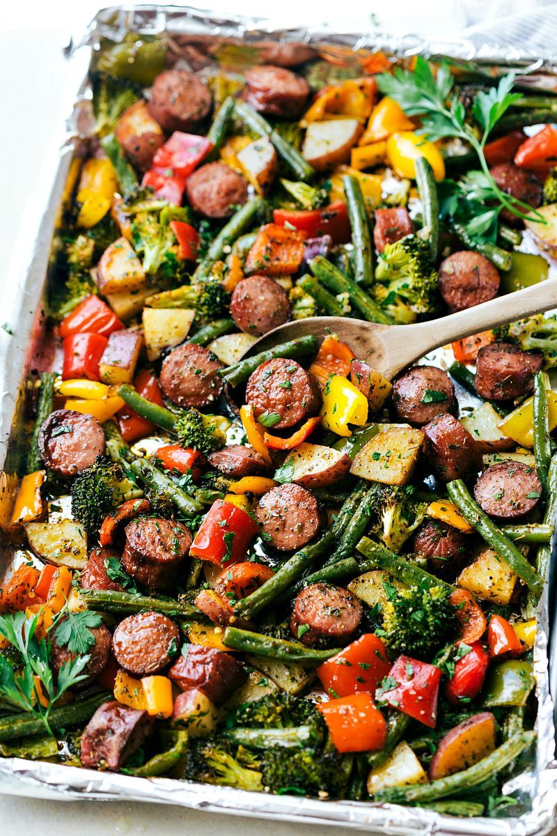 Roasted veggies with sausage and herbs all made and cooked on one pan. 10 minutes prep, easy clean-up! Recipe via