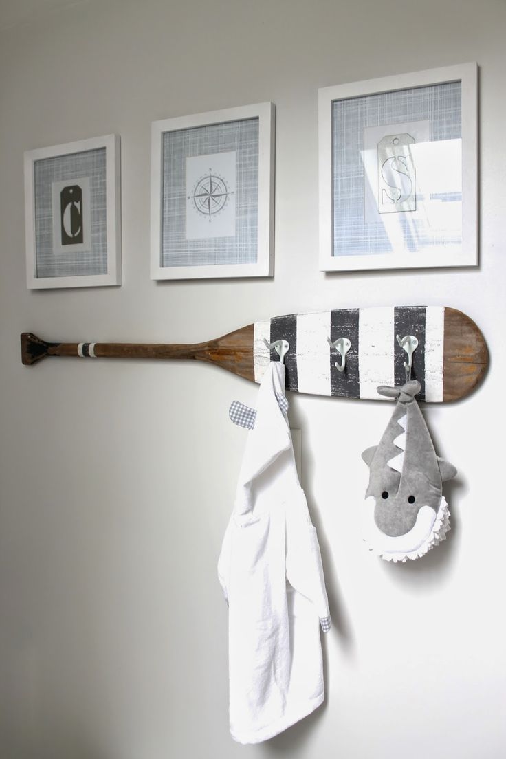 The perfect accessory for the nautical nursery. Paddle wall hooks, with a customised paint scheme.