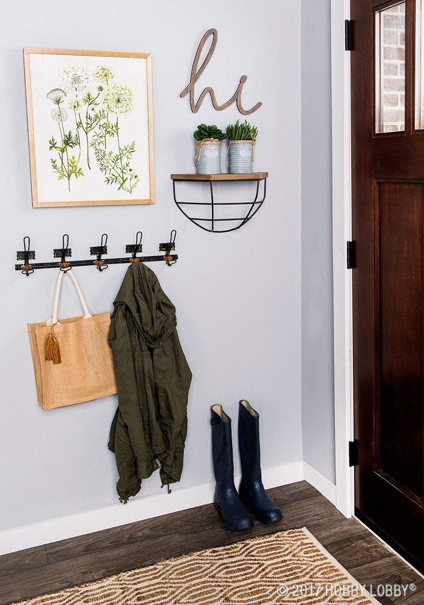 Add emphasis to your entryway with a simple, chic gallery wall. -   24 simple wall decor
 ideas