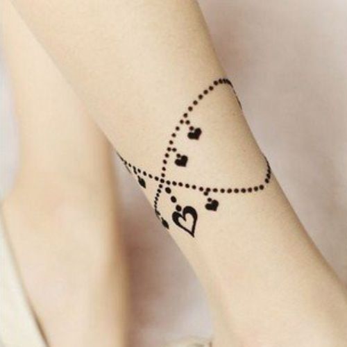 Top 15 Bracelet Tattoo Designs With Pictures -   20 tattoo leg bracelet
 ideas