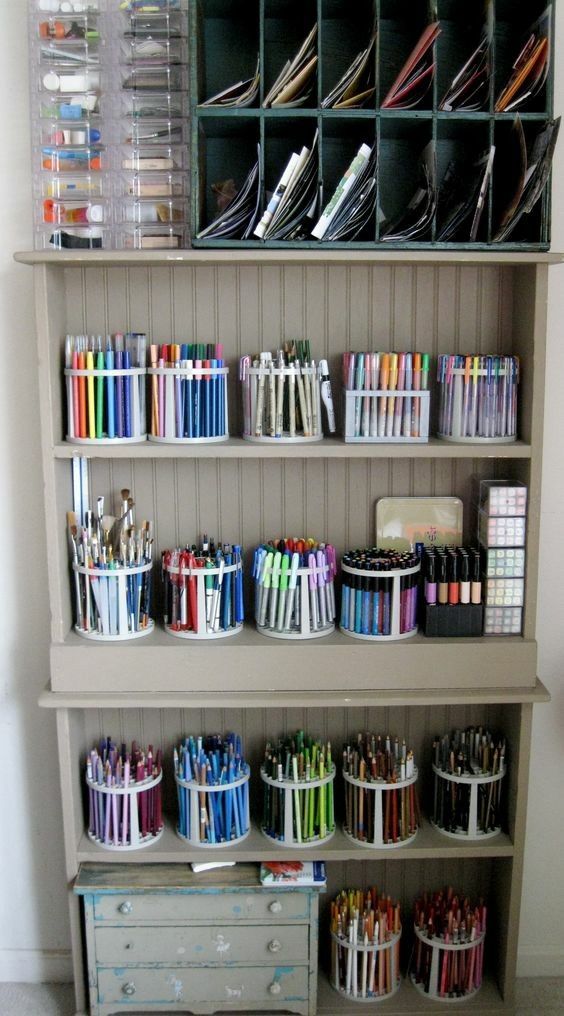 Beautifully organized craft supplies - looks the pens and markers and being stored in brush holders -   22 crafts organization pens
 ideas