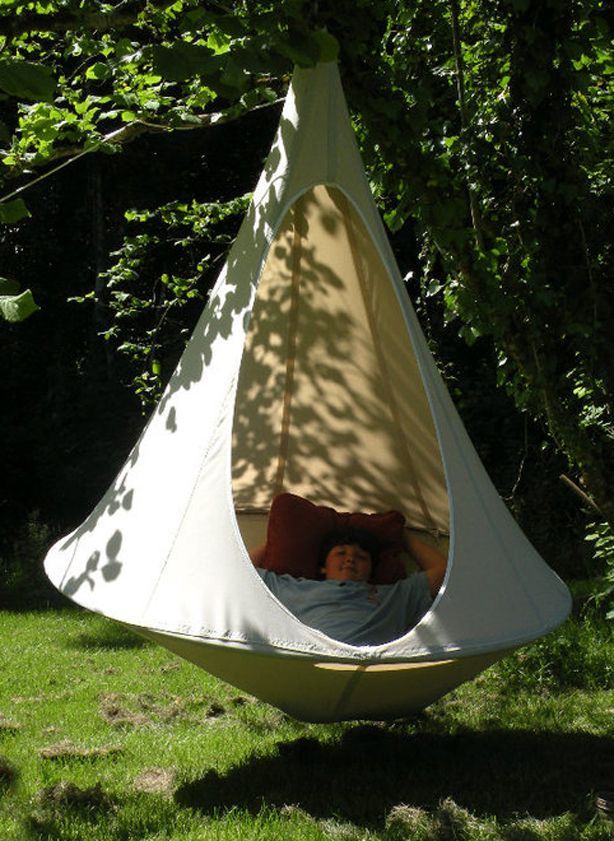 A blend of hammock, swing, hanging garden chair, teepee with a bit of bird nest, Cacoon is a new way to hang out and chill in the garden, on the patio, or in your living room. And it’s easy to bring with you or move from spot to spot: A single Cacoon packs down to a less than 8 x 31 inches, and it’s as easy to hang as it is to hang out in. -   24 garden seating swing
 ideas