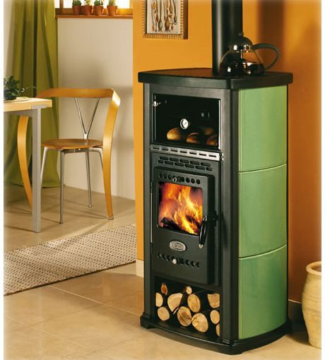 I love the woodstoves on this website! They are so cute--and some of them have little ovens on top! -   24 small decor wood
 ideas