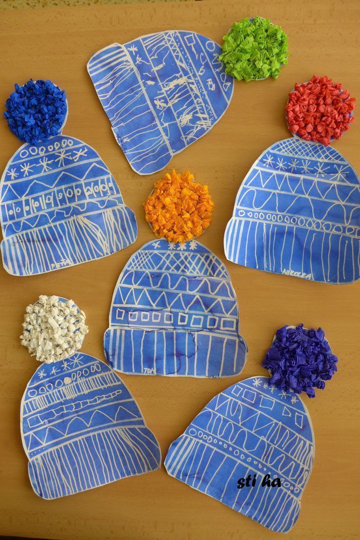 Winter hats craftivity. Draw designs with white crayon, then paint over with watercolor. These would make an adorable bulletin board! -   24 winter crafts mittens
 ideas