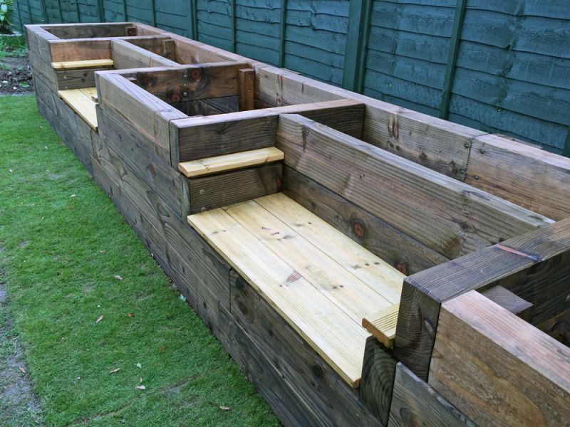 Raised beds with bench seats and arm wrest; backyard fire pit designs -   25 garden beds wall
 ideas