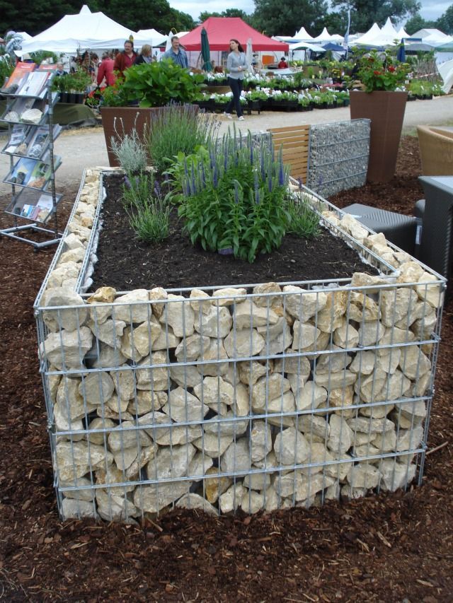 For our gabion foundation, we'll need wire mesh with a stronger frame. Don't want the bulging effect we've seen in some of these. -   25 garden beds wall
 ideas