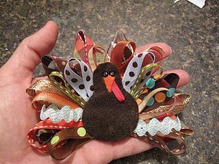 Turkey Pin How-To serendipitous!  So cute;  ribbon and felt with a clasp glued to the back make an ultra adorable holiday pin.  Easy enough to pit together in an hour. The link has great photos for reference on how to. -   25 ribbon crafts thanksgiving
 ideas