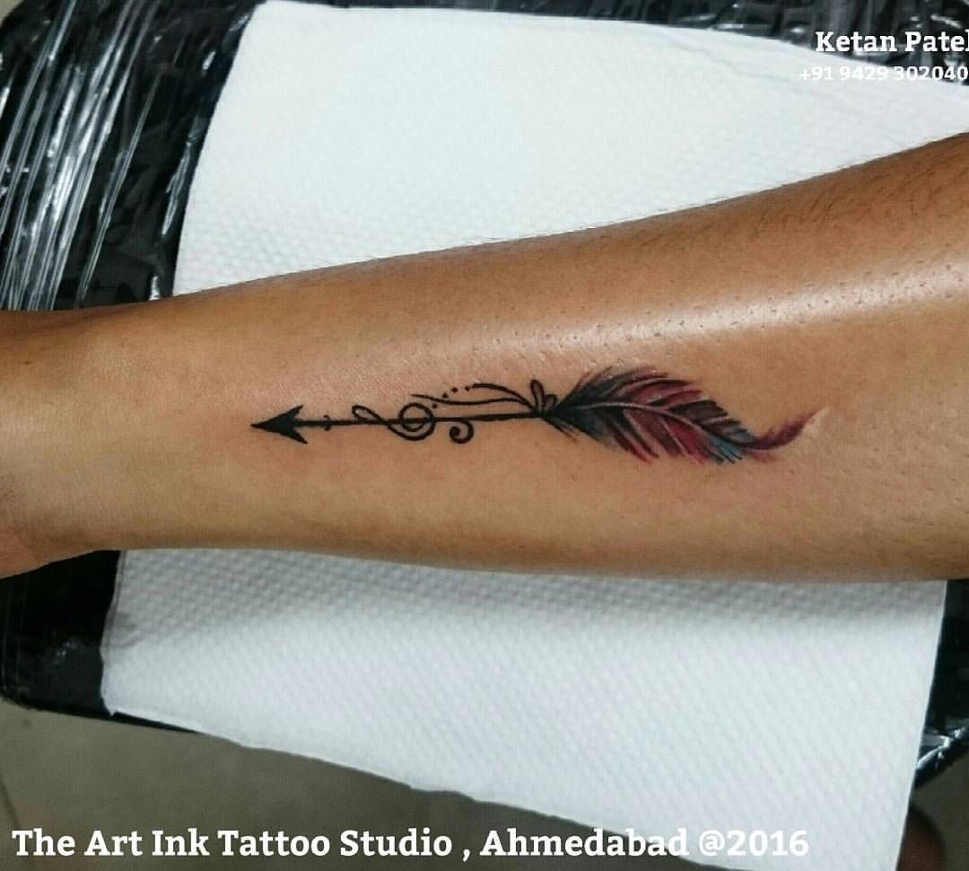 #arrow tattoo feather -   20 feather music tattoo
 ideas