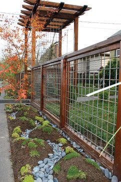 Beautiful utility panel fence design. Less costly than the full wood fences, and it would look great around the garden. -   24 rock garden fence
 ideas