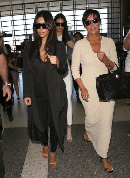 Kim Kardashian Photos Photos: The Kardashian Clan Catches a Flight -   25 kris kardashian style
 ideas