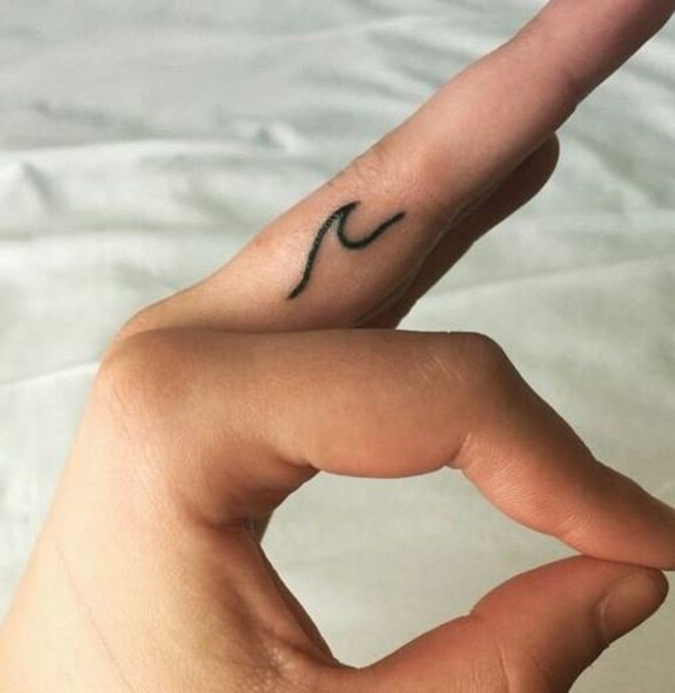 50 delicate and tiny finger tattoos to inspire your first (or next) body art -   20 small tattoo wave
 ideas