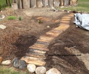 Use free wood pallets to make a walkway for your garden.  Easy and free! -   21 pallet garden walkway
 ideas