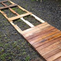 Expanding patio with repurposed pallets -   21 pallet garden walkway
 ideas