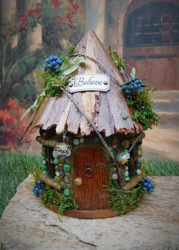 This Fairy Cottage would be perfect for any fairy garden that is under a covered patio due to the fact that it has a few silk fabric leaves on the roof. It could be used in a garden that is made using a pot or wine barrel and placed on a covered patio or in the shade. silk leaves may fade over time if left in direct sun light. This cottage would also look nice in your home d?cor.  The doors do not open on this cottage but included with your purchase will be a little fairy box if you have -   22 mini garden boxes
 ideas