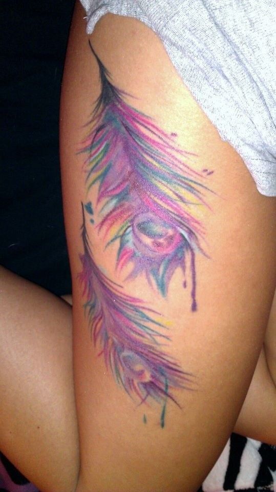 Excellent peacock feather watercolor tattoo on thigh leg for girls -   22 peacock thigh tattoo ideas