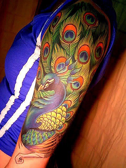 peacock tattoo -   22 peacock thigh tattoo ideas