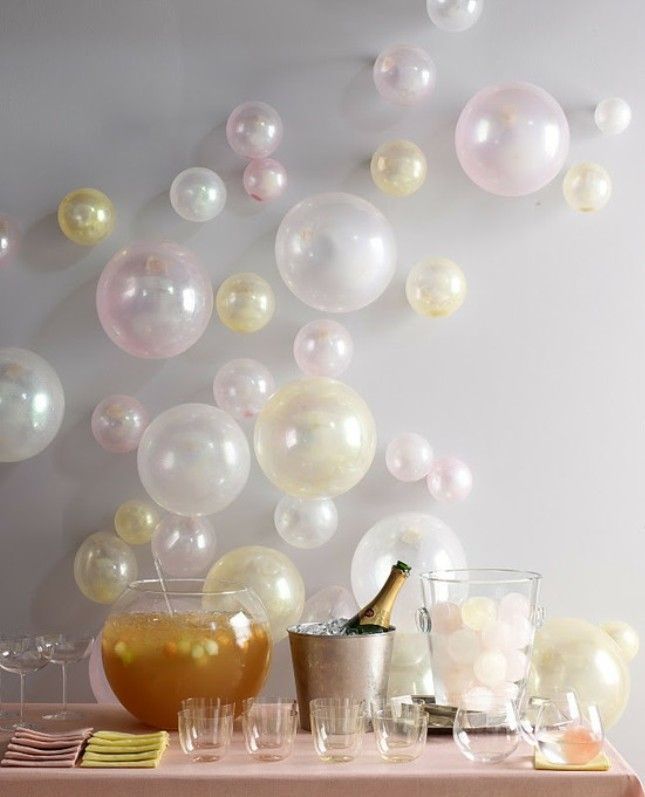 7. Balloons + Bubbly: All set to ring in the New Year, this refreshment table shows that even simple decorations like these “bubbly” balloons in pretty pastels can help create a party atmosphere. (via Honey & Fitz) -   23 cute party decor
 ideas