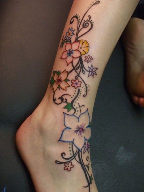 Elegant Color Flower Vine Tattoo On Foot And Leg -   24 feminine foot tattoo
 ideas