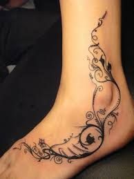 24 feminine foot tattoo
 ideas