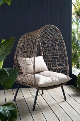 A cosy sit-out for your backyard! Our luxurious chair makes a perfect spot for your reading sessions or that peaceful tea time. -   24 garden seating tea time
 ideas