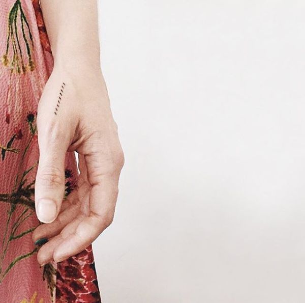 35 Minimalist Tattoos That Are Impossibly Pretty -   25 minimalist tattoo book
 ideas
