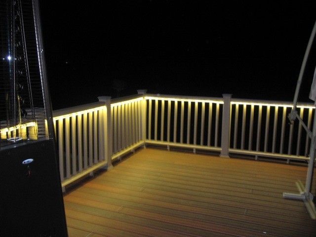 Deck rail lighting- this would be really cool for the summertime and backyard parties -   25 upper deck decor
 ideas