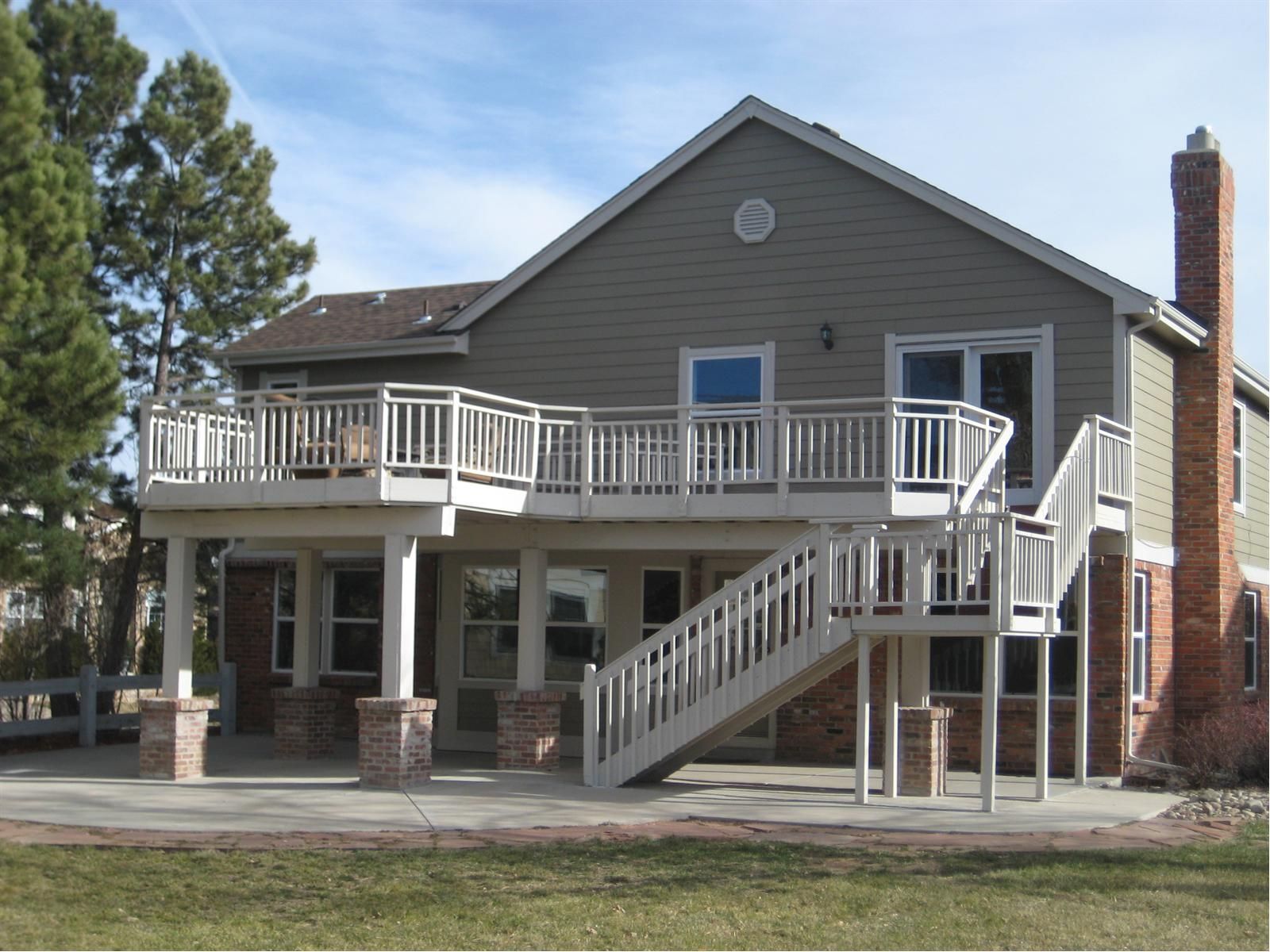 Large upper deck and concrete area below with access to walk out basement.  Gorgeous views! -   25 upper deck decor
 ideas