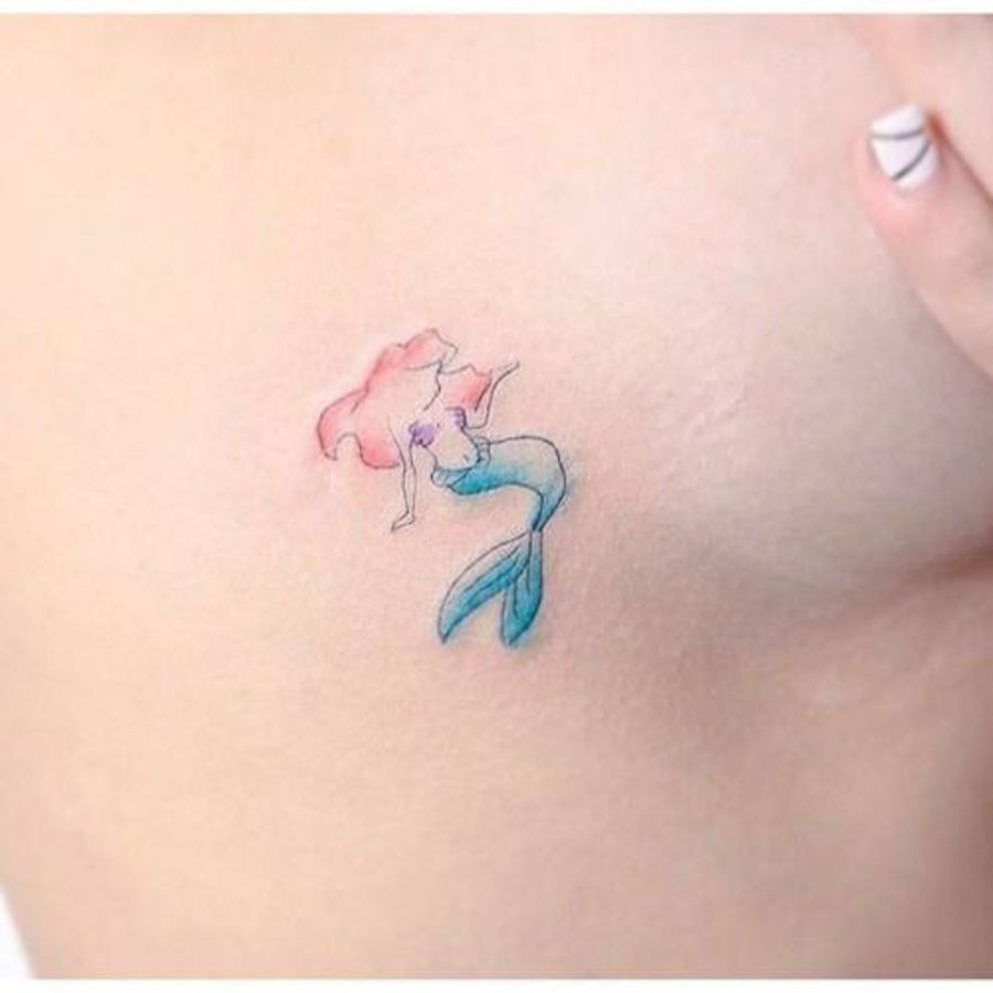 Show off your huge love for Disney with a watercolor princess. -   19 underboob tattoo watercolor
 ideas