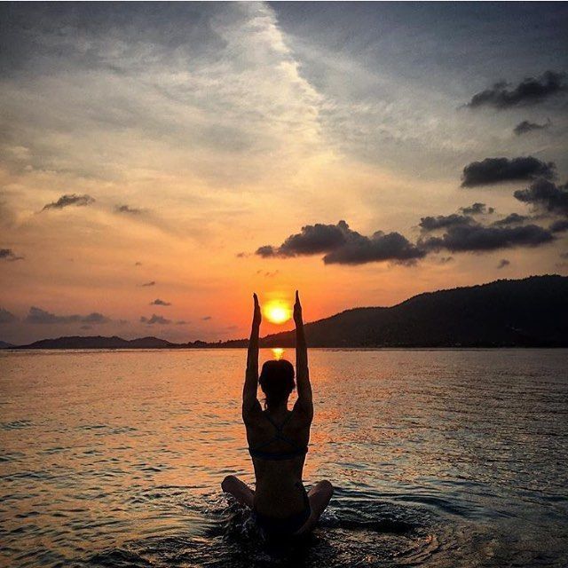 Ahhh! That looks relaxing.  Beautiful yoga pose while the sun goes down.  What a calm and serine way to end the day. -   21 fitness photography pilates
 ideas